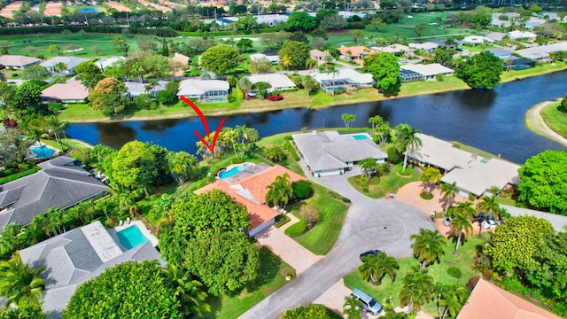 aerial view with a water view and a residential view