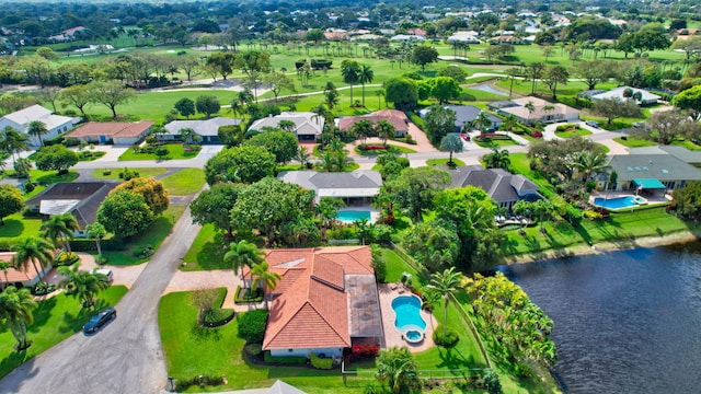 bird's eye view with a water view and a residential view