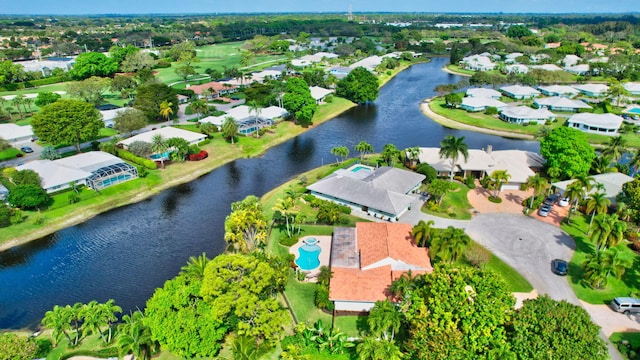 aerial view featuring a water view and a residential view