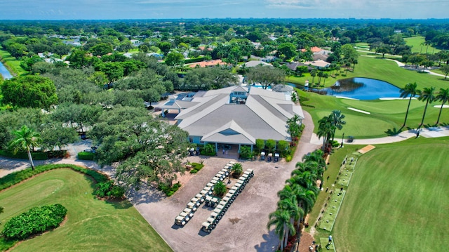 drone / aerial view featuring a water view and golf course view