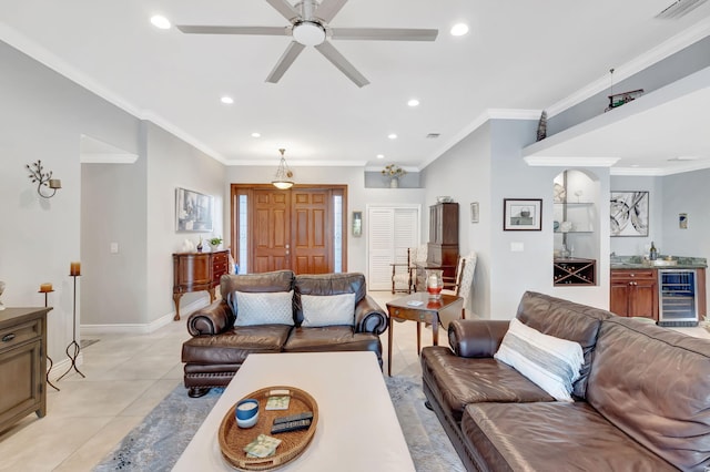 living room featuring visible vents, baseboards, wine cooler, light tile patterned flooring, and recessed lighting