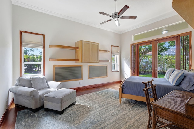 bedroom with multiple windows, crown molding, dark hardwood / wood-style floors, and french doors