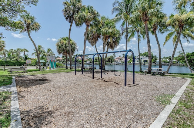 view of play area with a water view