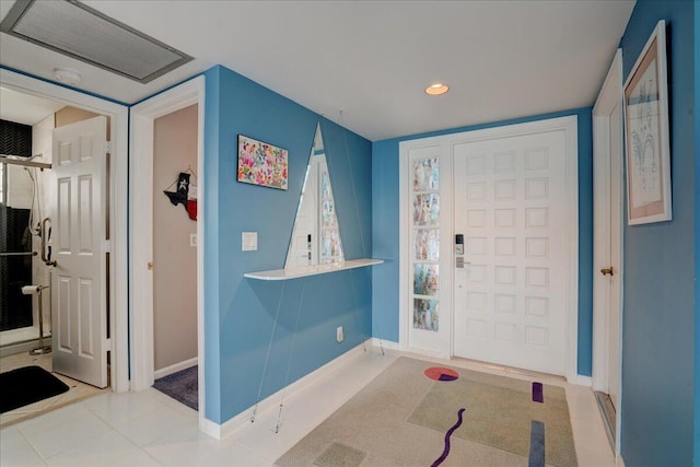 entryway with recessed lighting, visible vents, and baseboards