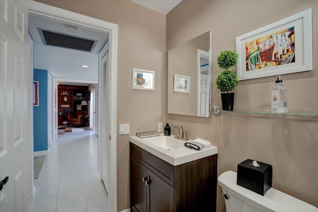 half bathroom with recessed lighting, visible vents, toilet, vanity, and tile patterned flooring