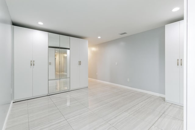 interior space featuring light tile patterned floors