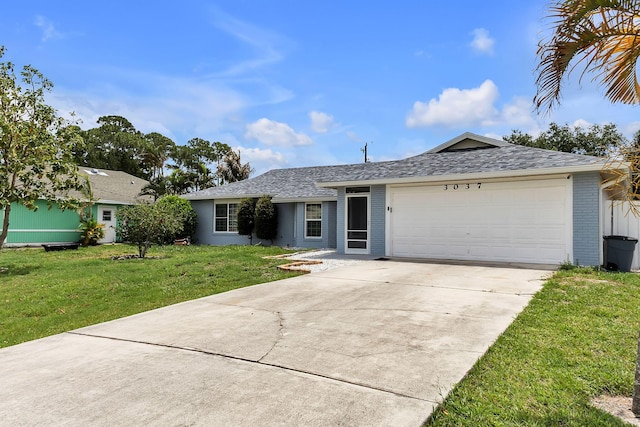 ranch-style house featuring a garage and a front yard