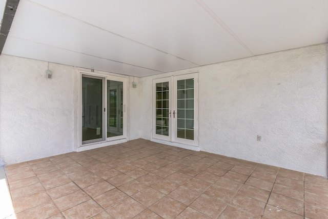 view of patio featuring french doors