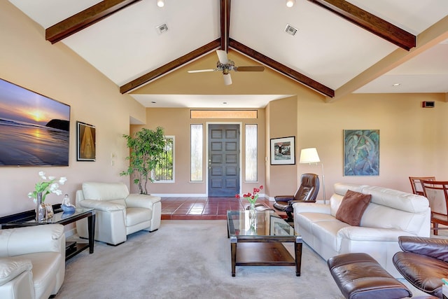 living area featuring lofted ceiling with beams, visible vents, light colored carpet, and light tile patterned floors