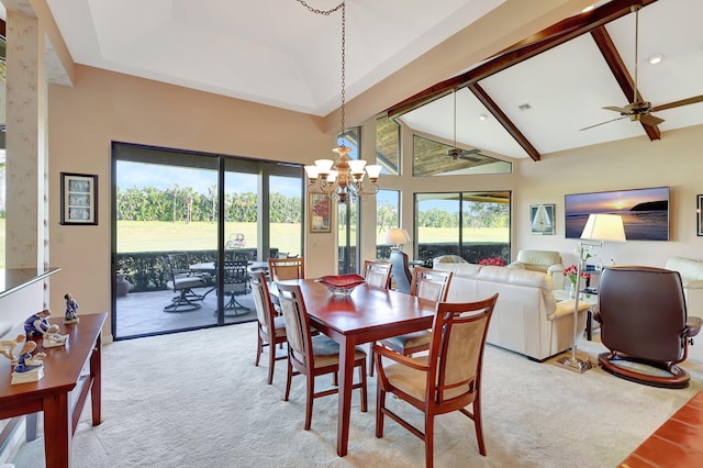 carpeted dining room featuring beam ceiling, ceiling fan with notable chandelier, and high vaulted ceiling