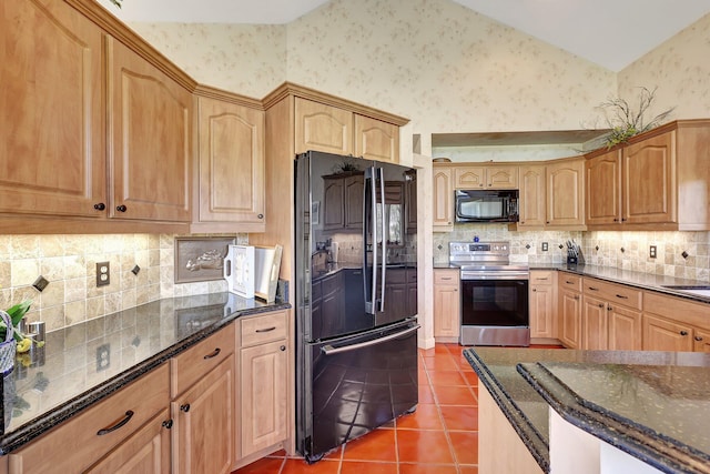 kitchen with backsplash, tile patterned flooring, dark stone counters, high vaulted ceiling, and black appliances