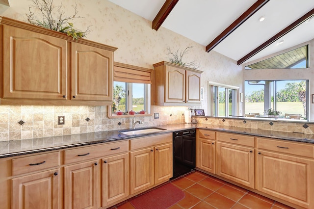 kitchen featuring vaulted ceiling with beams, sink, black dishwasher, light brown cabinets, and dark stone counters