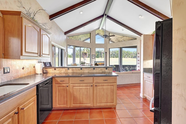 kitchen with ceiling fan, black appliances, vaulted ceiling with beams, kitchen peninsula, and plenty of natural light