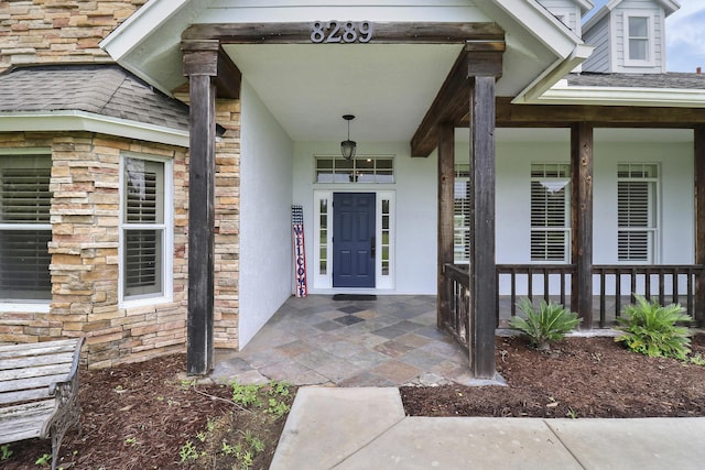 property entrance with a porch