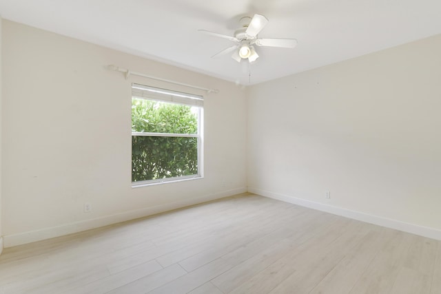 empty room featuring ceiling fan and light hardwood / wood-style floors