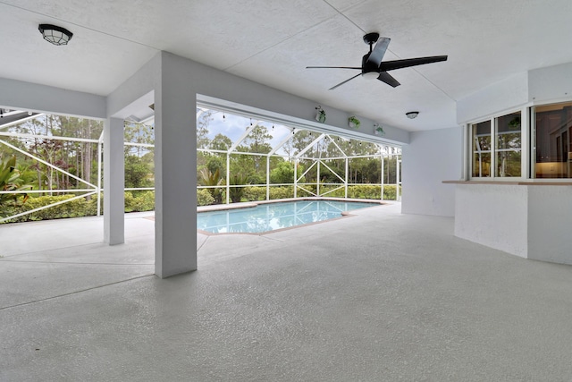 view of pool featuring ceiling fan