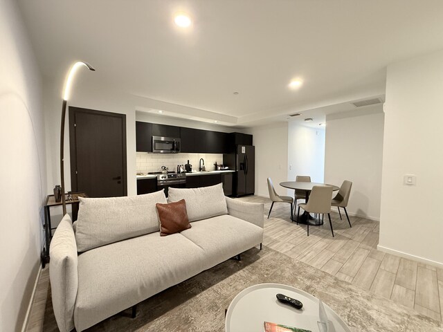 398 NE 5th St Unit 1715, Miami, FL 33132 - living room featuring sink