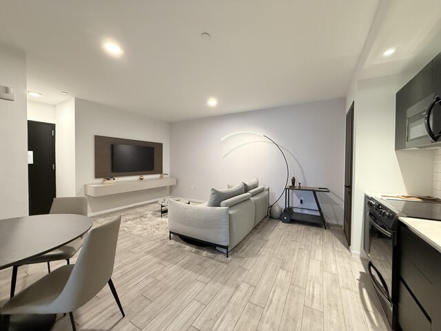 398 NE 5th St Unit 1715, Miami, FL 33132 - living room with light wood-type flooring