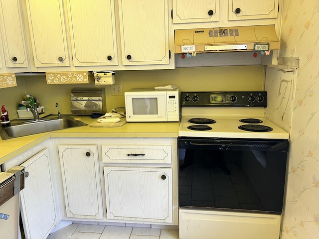 kitchen with dishwasher, light tile patterned flooring, sink, electric range oven, and extractor fan