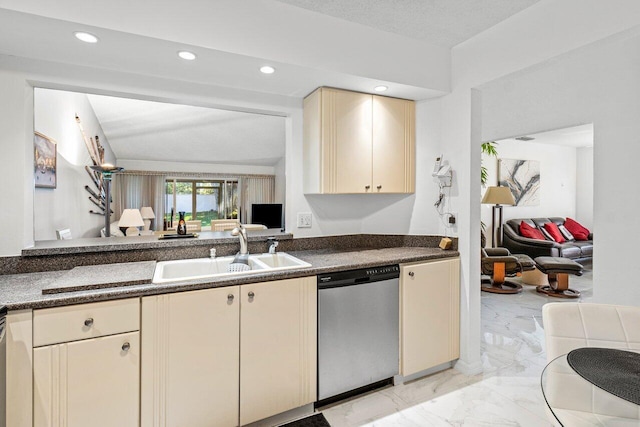 kitchen with cream cabinetry, stainless steel dishwasher, and sink