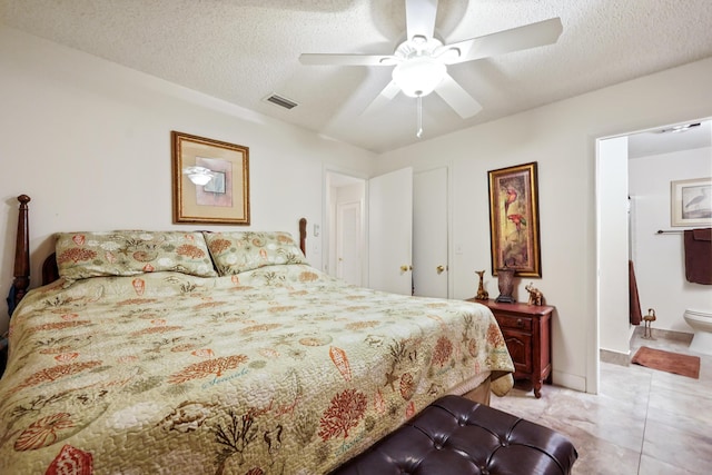 bedroom featuring visible vents, a textured ceiling, and ceiling fan