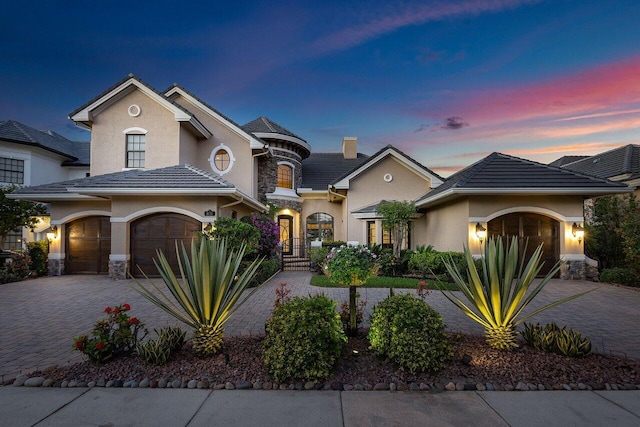 view of front of home with a garage