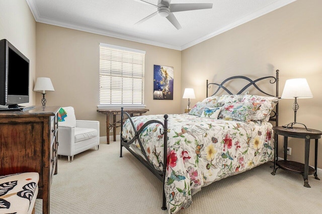 bedroom featuring ceiling fan, light colored carpet, and ornamental molding