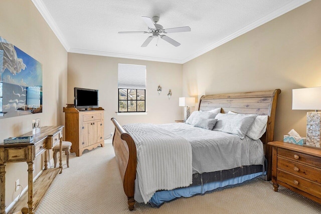 bedroom featuring light carpet, a textured ceiling, ceiling fan, and ornamental molding