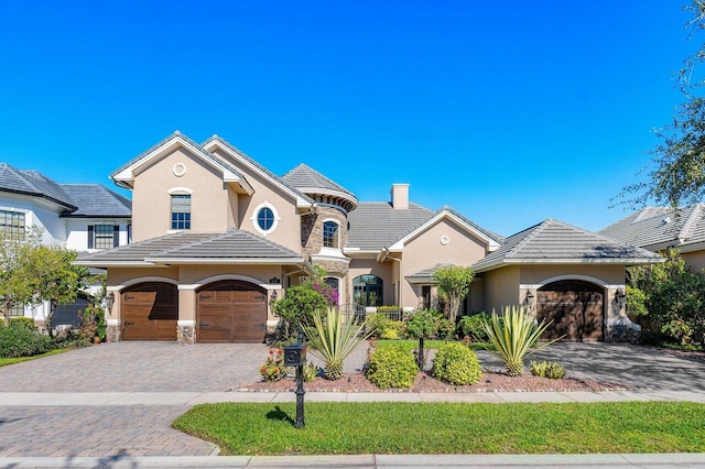 view of front of home with a garage