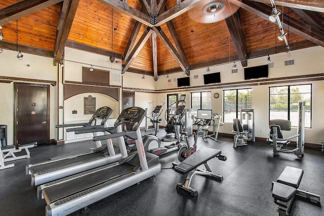 gym featuring high vaulted ceiling and wooden ceiling