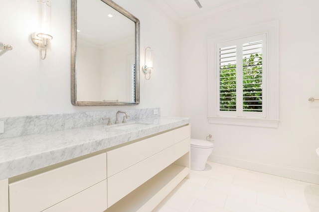 bathroom featuring ornamental molding, tile patterned flooring, vanity, and toilet