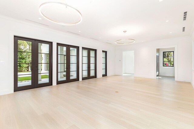 spare room with light wood-type flooring