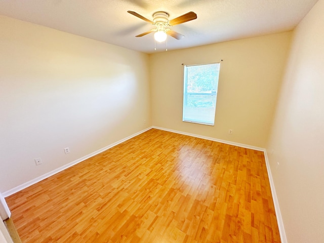 unfurnished room with hardwood / wood-style floors, a textured ceiling, and ceiling fan