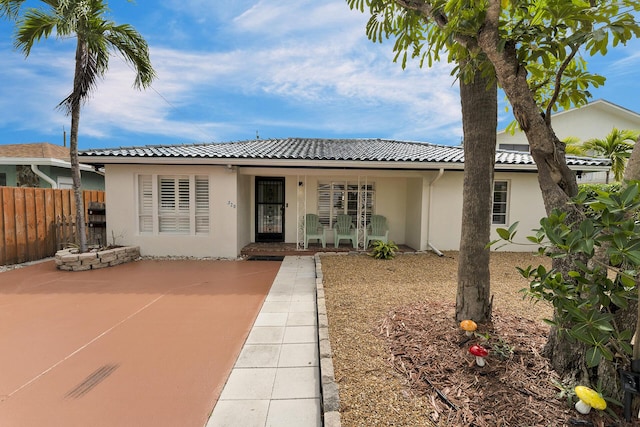 view of front of home featuring a patio area