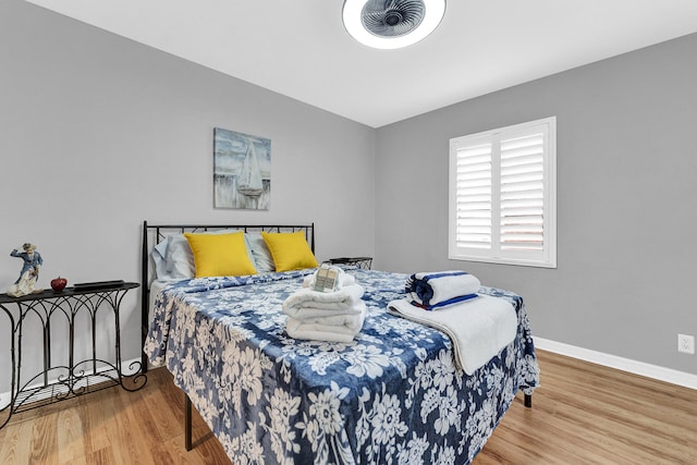 bedroom featuring wood-type flooring