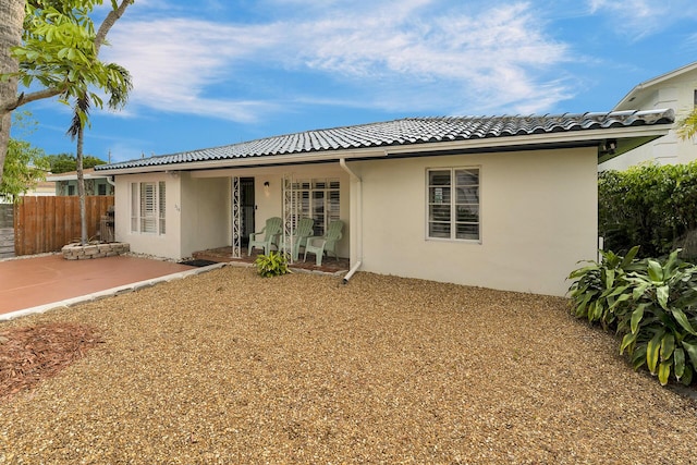 rear view of house with a patio area