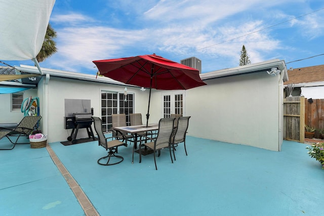 view of patio featuring french doors