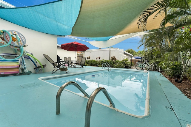 view of pool with a patio