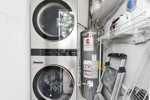 washroom featuring stacked washer and dryer and gas water heater