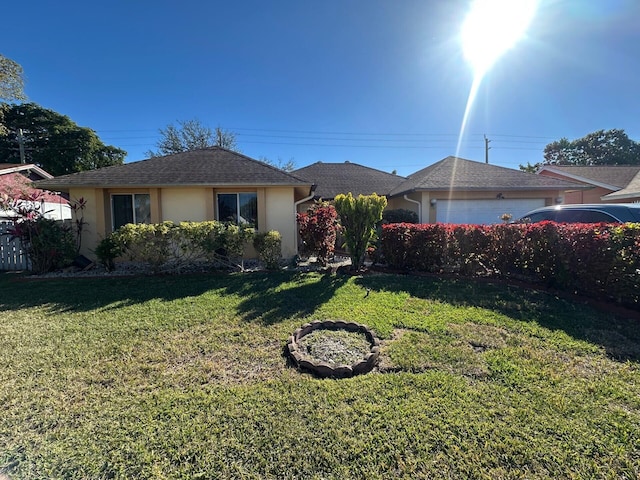 single story home with a front yard