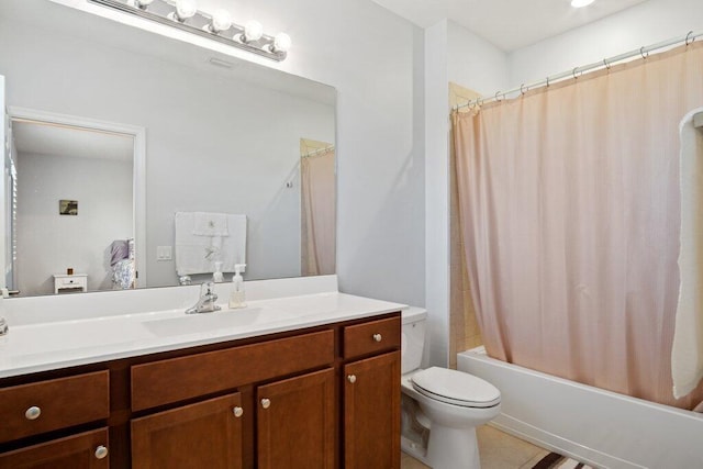 full bathroom featuring tile patterned floors, shower / bathtub combination with curtain, vanity, and toilet