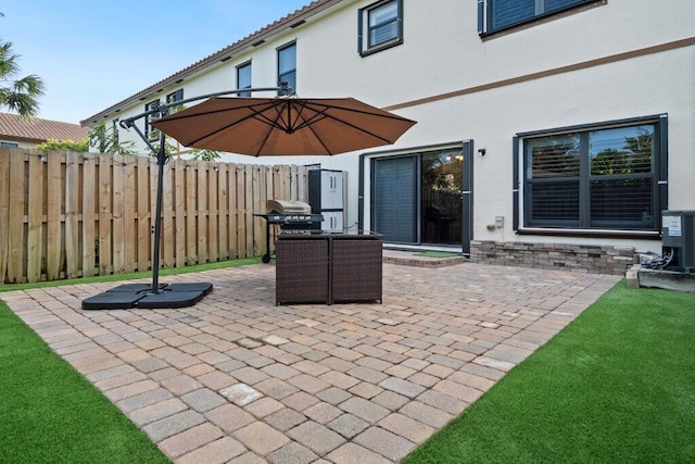 view of patio / terrace with central AC unit and grilling area