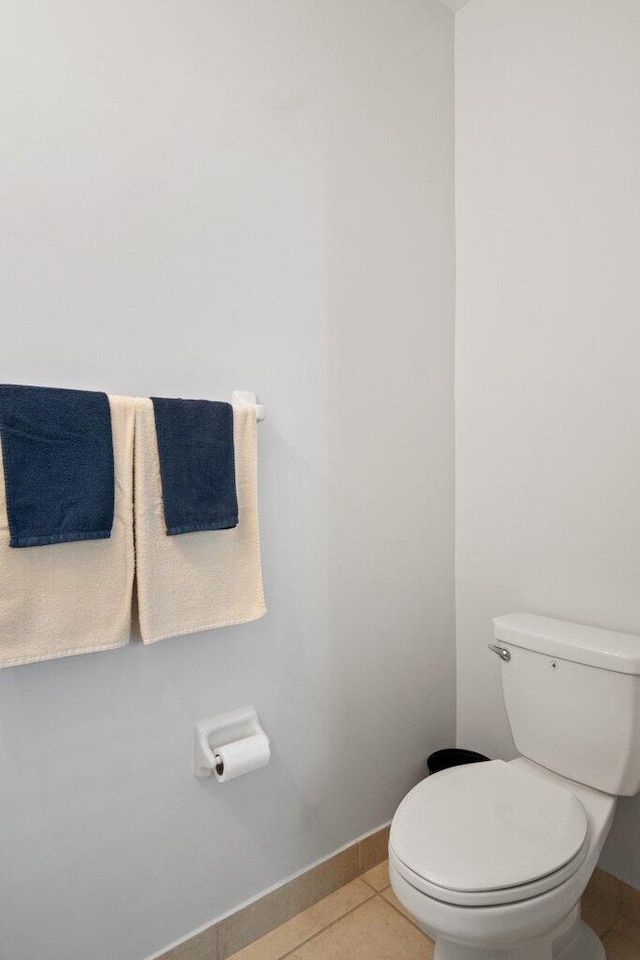 bathroom featuring tile patterned floors and toilet