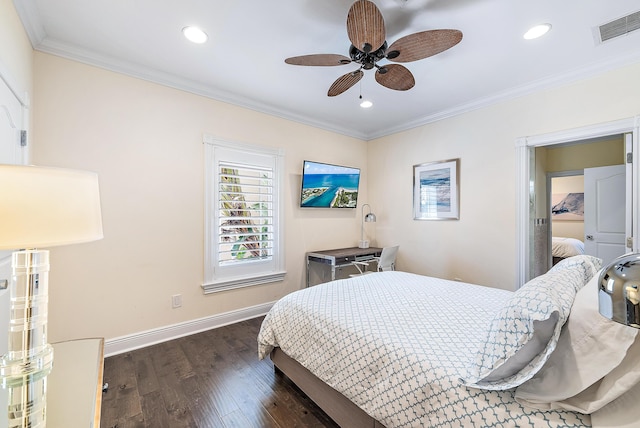 bedroom featuring ceiling fan, dark hardwood / wood-style flooring, and crown molding