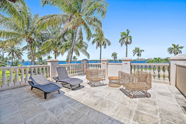 view of patio / terrace featuring a water view