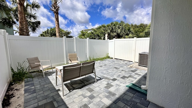 view of patio with central air condition unit