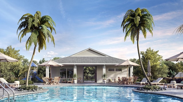 view of pool with a playground and a patio area