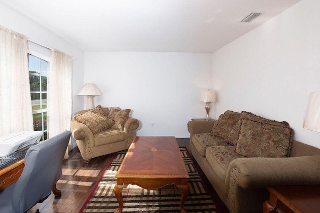 living room with dark hardwood / wood-style floors