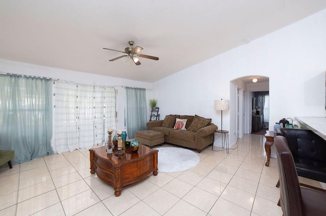 living room featuring ceiling fan and light tile patterned flooring