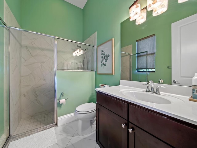 bathroom featuring a shower with shower door, vanity, tile patterned floors, and toilet